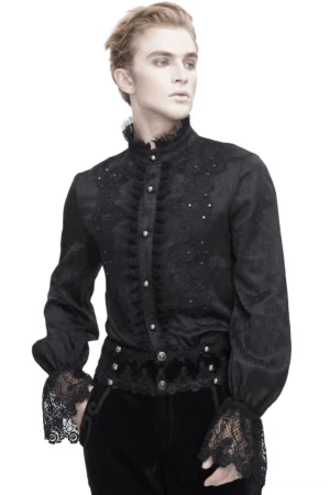 Male model wearing black Victorian lace-trimmed gothic shirt with high ruffled collar, front three-quarter view showcasing ornate metal buttons and lace front panel details