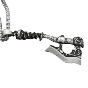 Dark antique silver Viking axe necklace with skull-carved handle and wheat link chain, displayed in flat side view