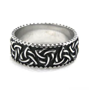 Gothic stainless steel Viking knot ring left side oblique view displaying embossed Celtic pattern and smooth inner surface