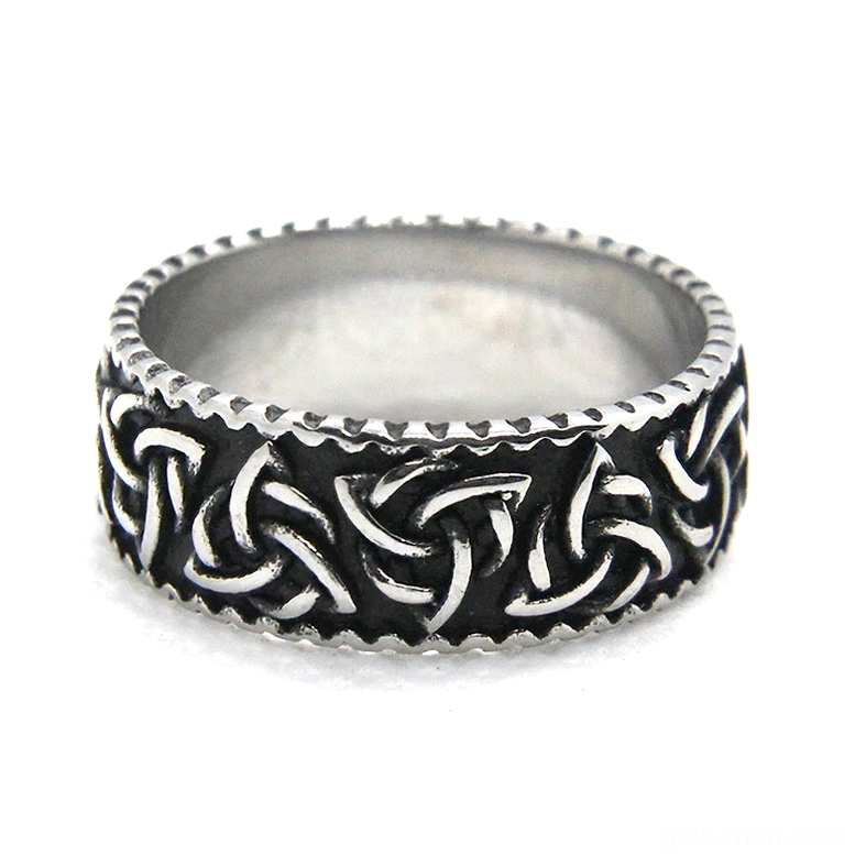 Gothic stainless steel Viking knot ring left side oblique view displaying embossed Celtic pattern and smooth inner surface