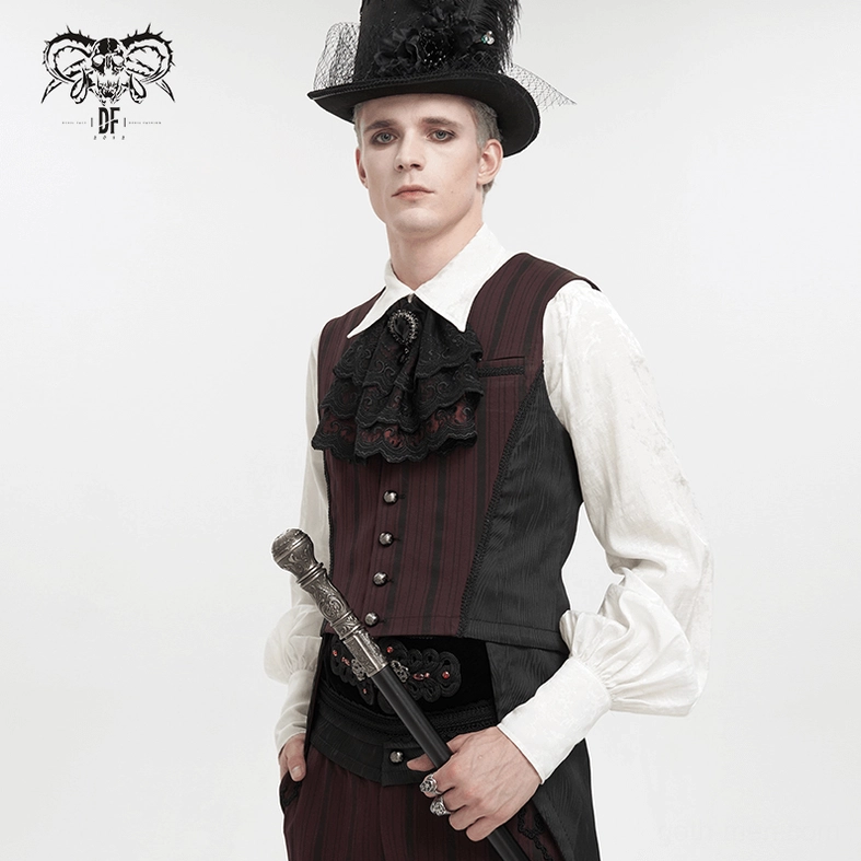 Male model in gothic vintage formal outfit with lace cravat, holding walking cane, side view with top hat