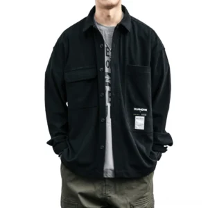 Black waffle texture oversized gothic shirt front view on male model - dark alternative style casual wear