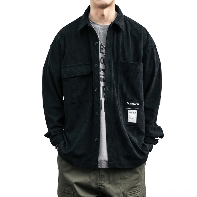 Black waffle texture oversized gothic shirt front view on male model - dark alternative style casual wear