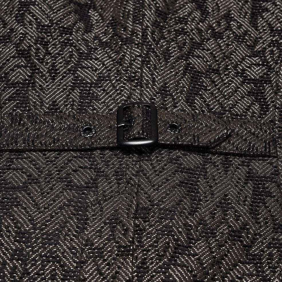 Macro close-up of adjustable black buckle on coffee jacquard gothic waistcoat back strap