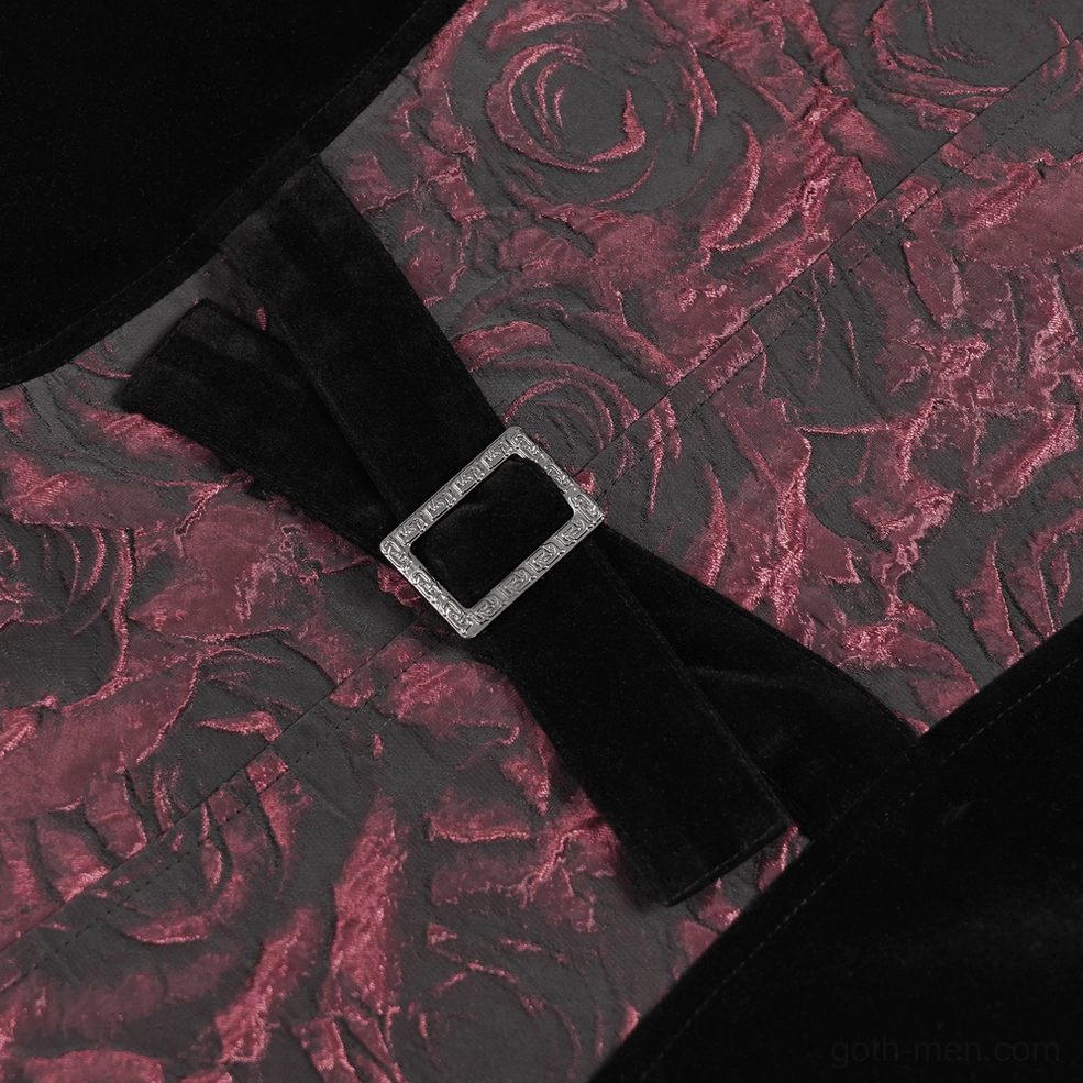 Detailed view of asymmetrical pointed hemline and velvet construction on gothic waistcoat, bottom focus