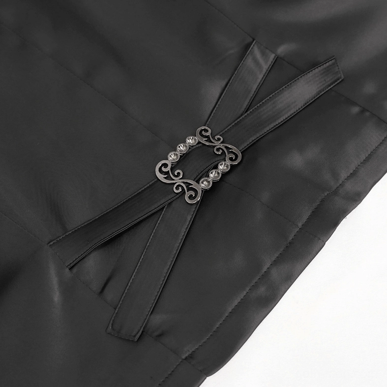 Back belt buckle detail of black gothic waistcoat, carved vintage metal hardware and faux leather straps