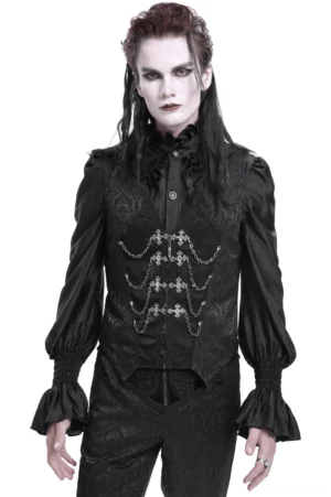 Black gothic brocade waistcoat with cross chain details worn by male model in full-body front view against white background