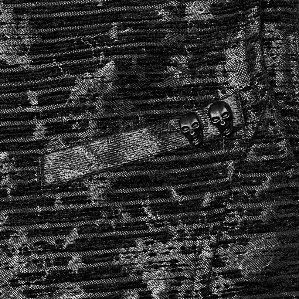 Detail shot of black jacquard gothic waistcoat fabric showing intricate striped floral weave pattern and texture