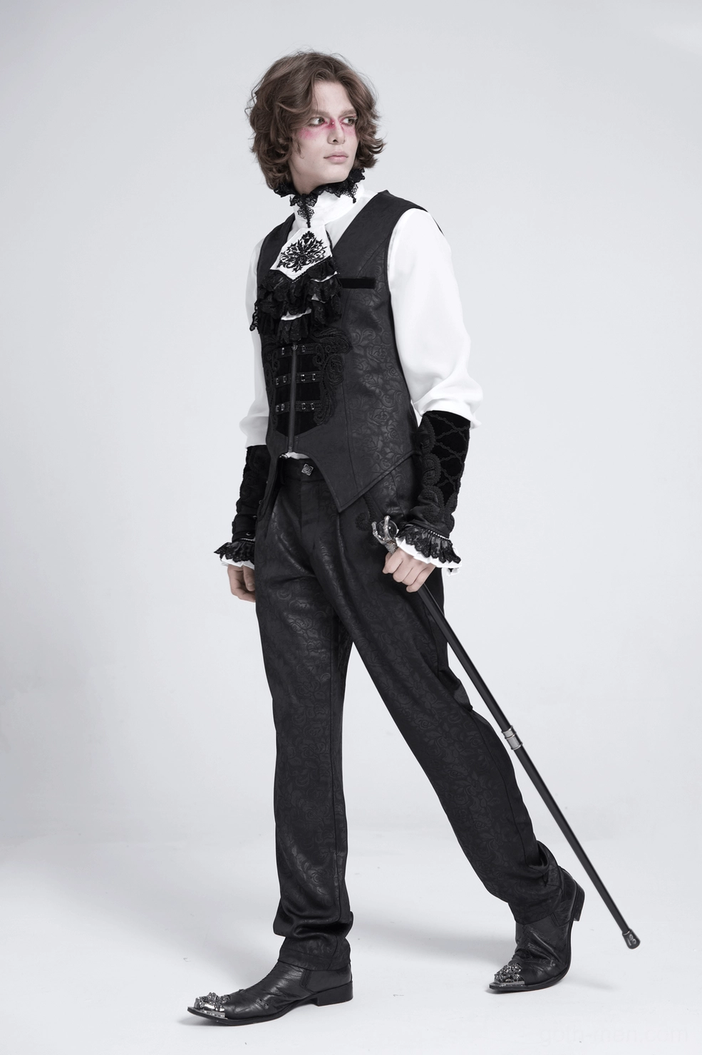 Gothic waistcoat casual alternative style paired with jeans and band merchandise