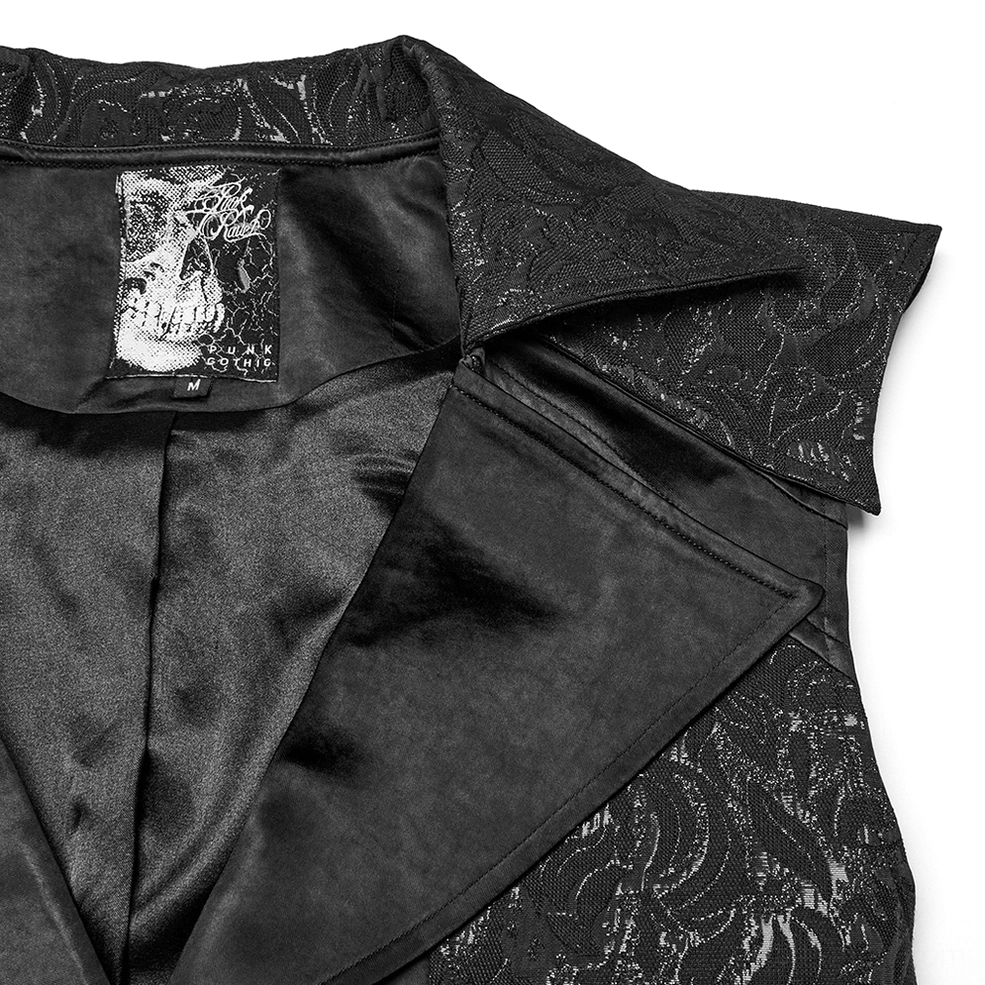 Close-up detail of black gothic waistcoat collar showing satin lining, embossed jacquard collar fabric, and skull-branded inner tag