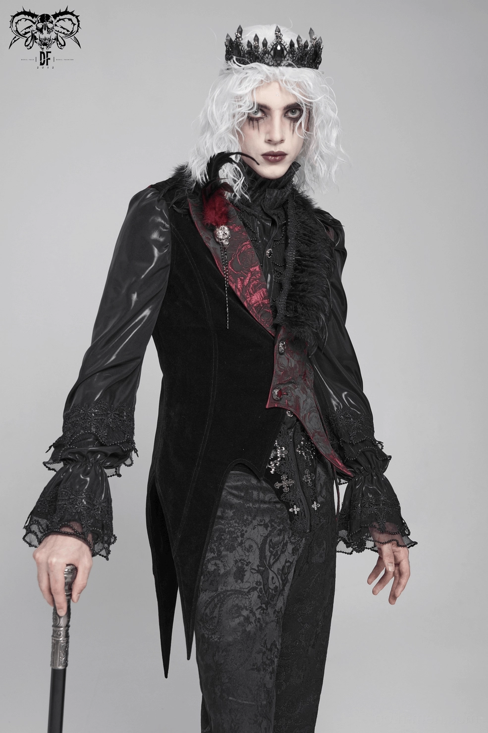 Angled view of wine red and black gothic waistcoat showing color contrast, feather lapel, and hemline asymmetry