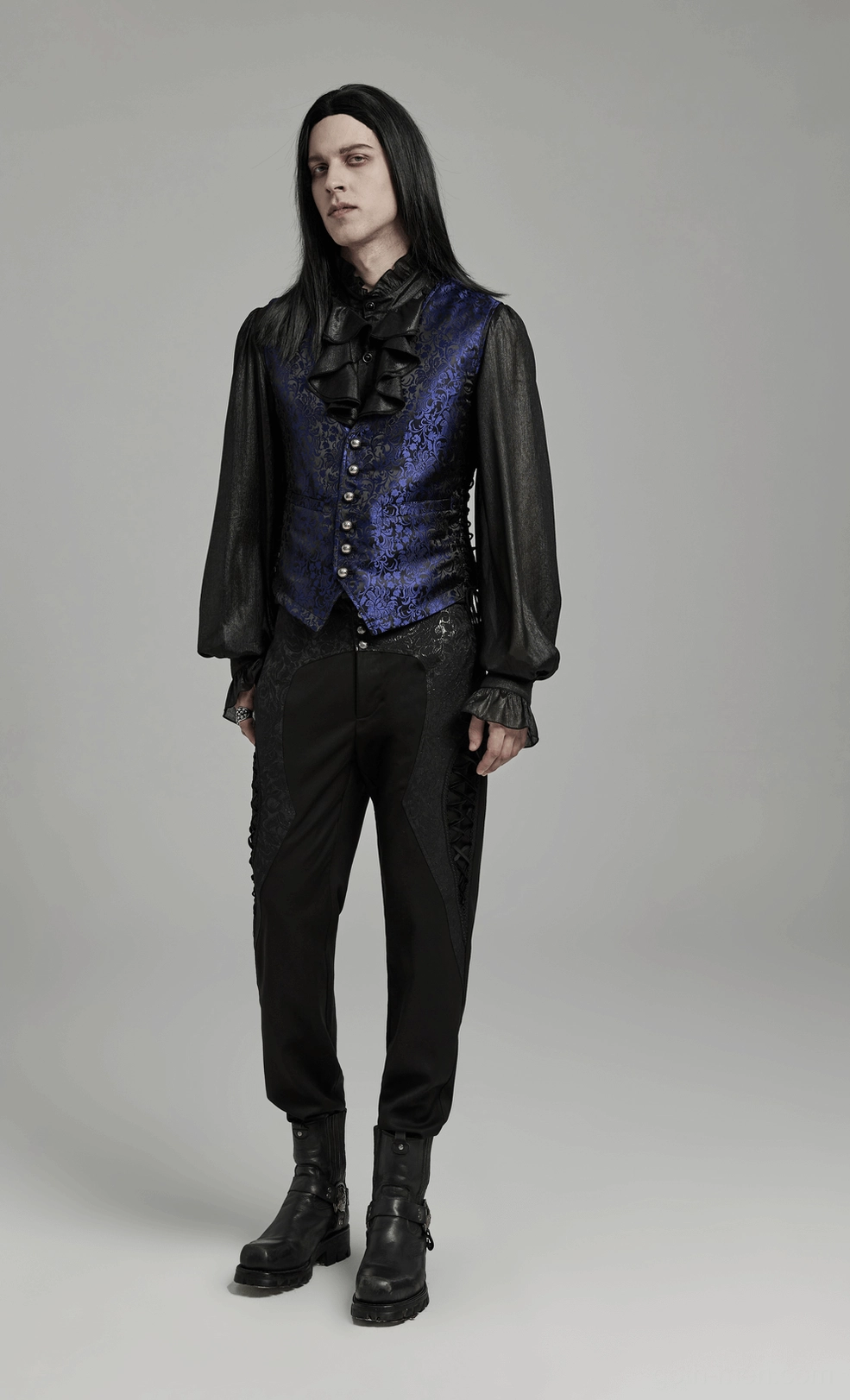 Gothic waistcoat styling reference showing complete look with long-haired male model wearing black-blue jacquard waistcoat with formal shirt and accessories