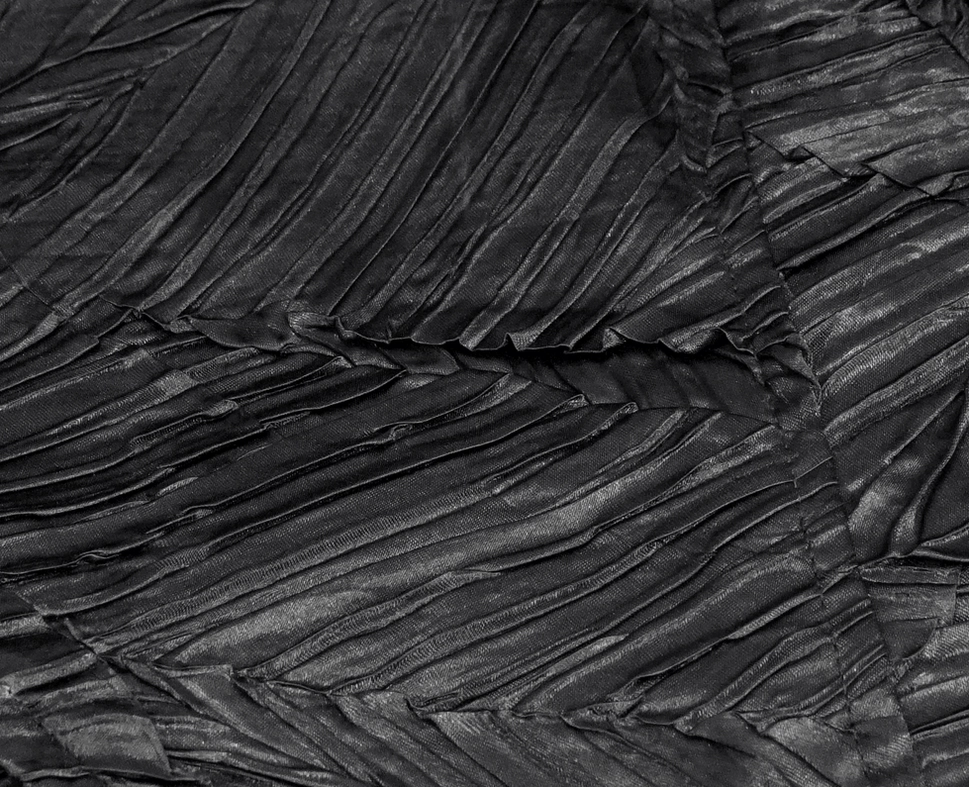 Gothic waistcoat fabric detail close-up highlighting crinkled texture and material quality
