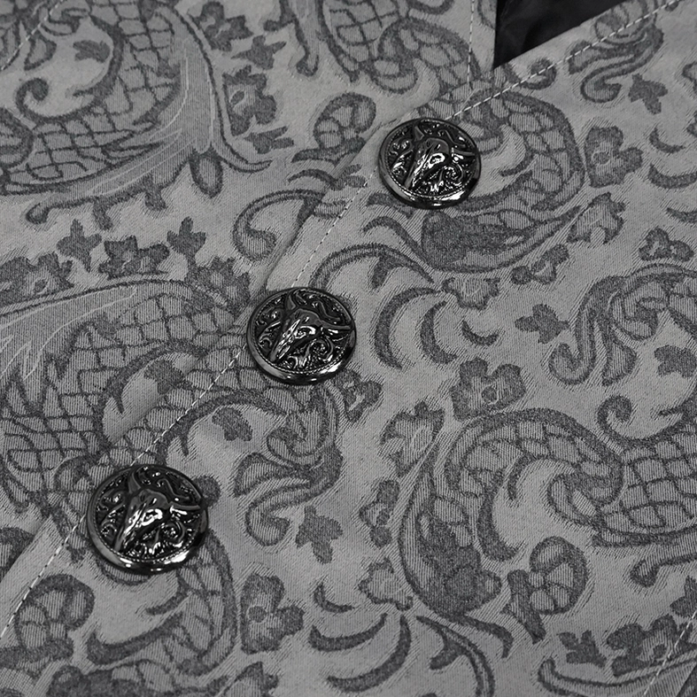 Macro close-up of decorative carved vintage metal buttons on men's gothic jacquard waistcoat