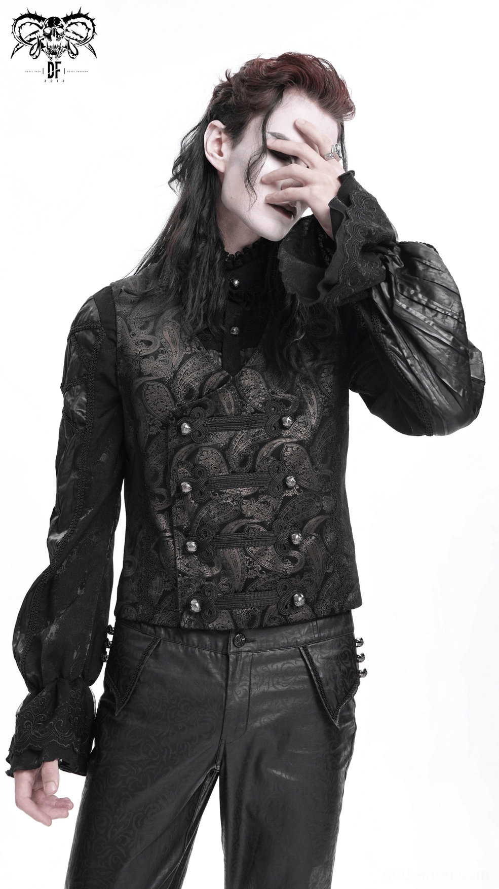 Formal gothic waistcoat on male model styled with white ruffled shirt and dark tailored trousers