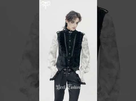 Detail shot of black velvet gothic waistcoat front closure and decorative button hardware