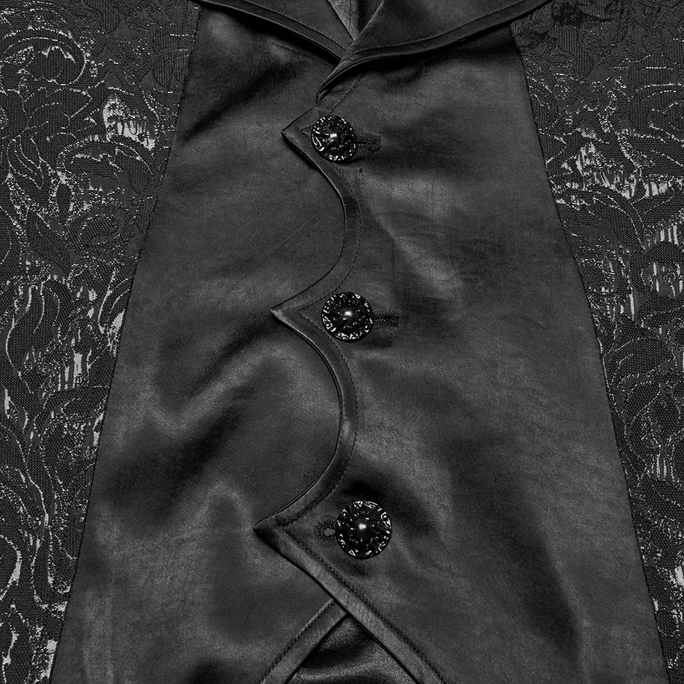 Close-up detail of black gothic waistcoat front placket with ornate decorative buttons, asymmetrical cut, and jacquard-satin blend fabric