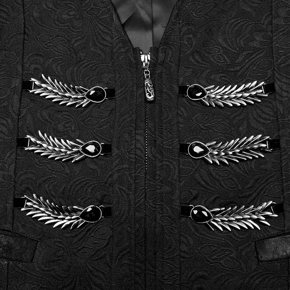 Close-up detail of black gothic waistcoat front showing dual rows of wing-shaped metal decorations with black gemstone accents and central front zipper