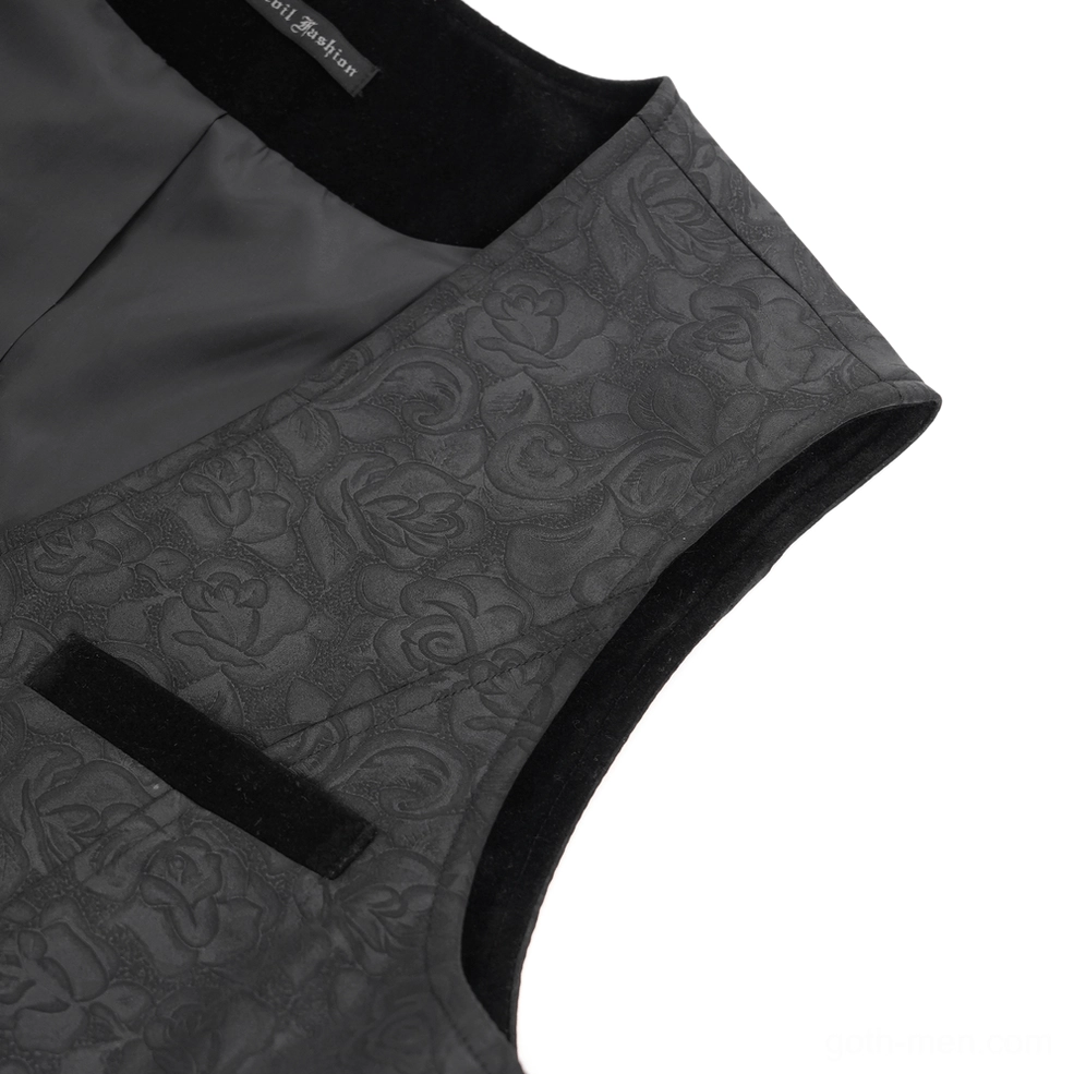 Close-up detail of gothic waistcoat front panel showing floral jacquard texture and velvet pocket trim