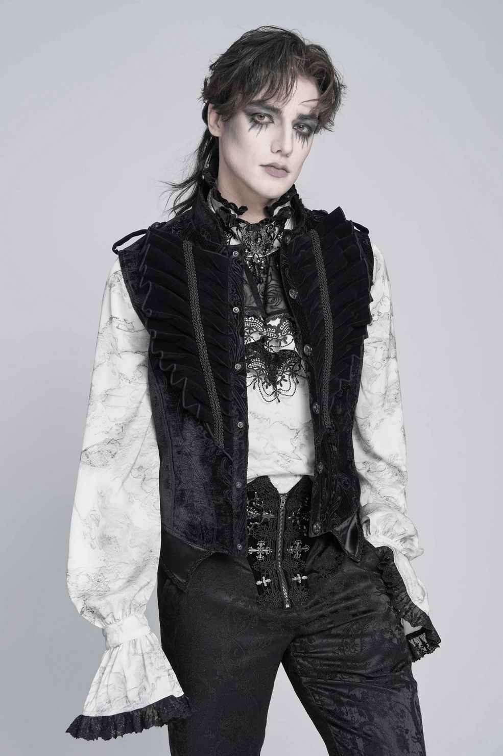 Bottom hem and side detail of men's gothic waistcoat showing curved hem construction and tailored fit