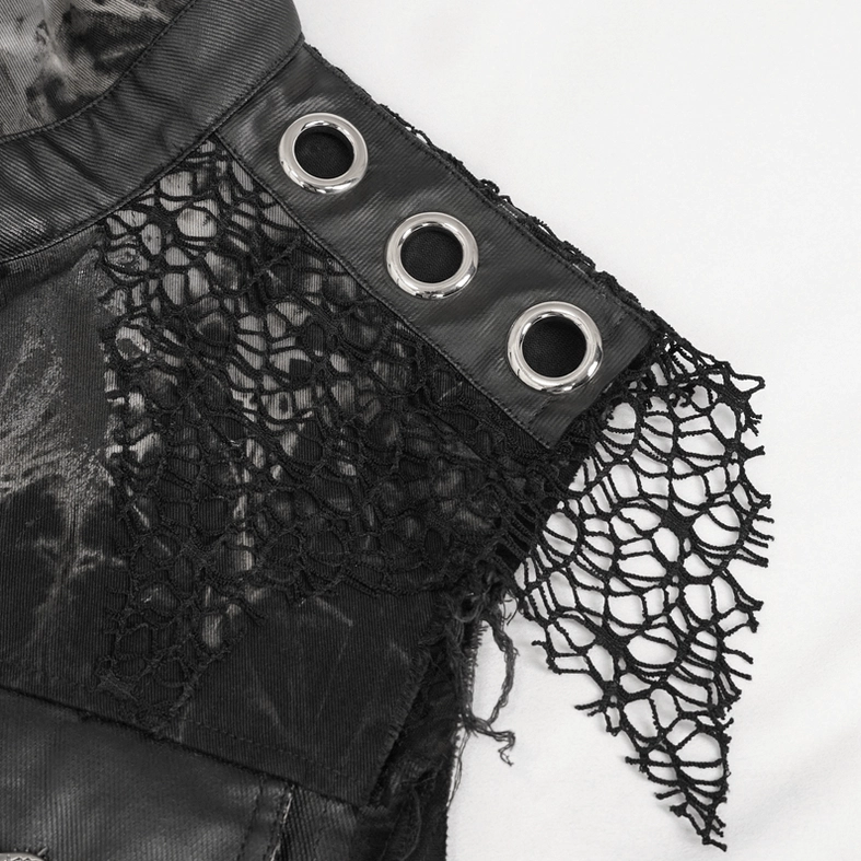 Black mesh lace trim with metal grommets and frayed fabric edges detail shot