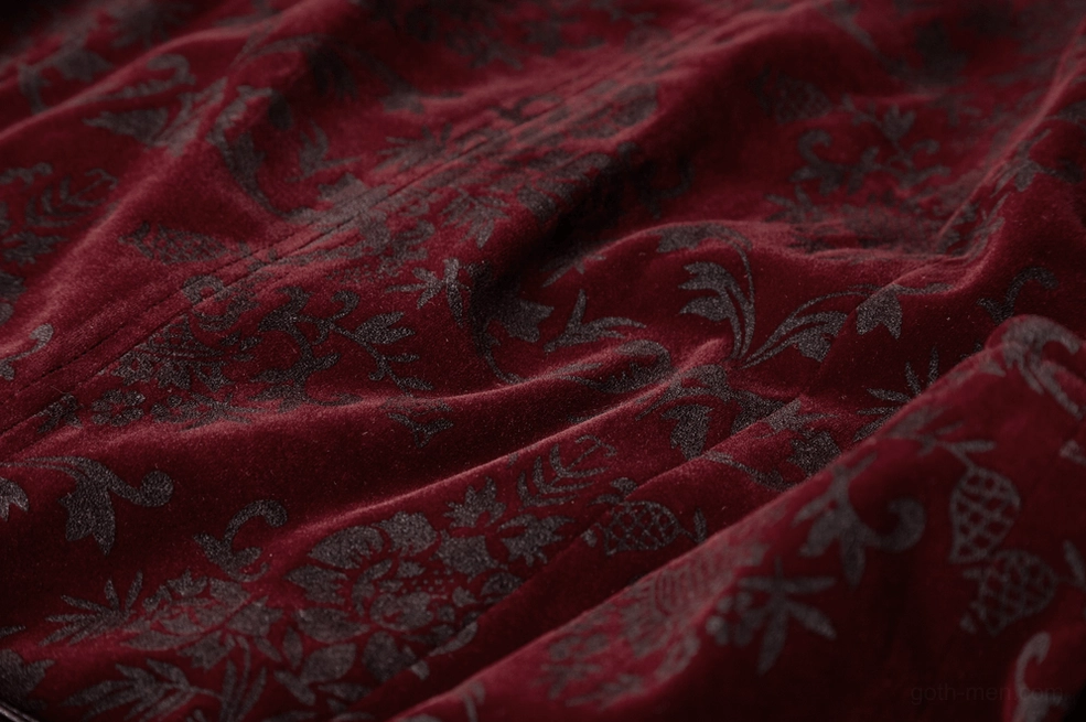 Overhead view of wine red gothic waistcoat showing complete damask print pattern and construction quality