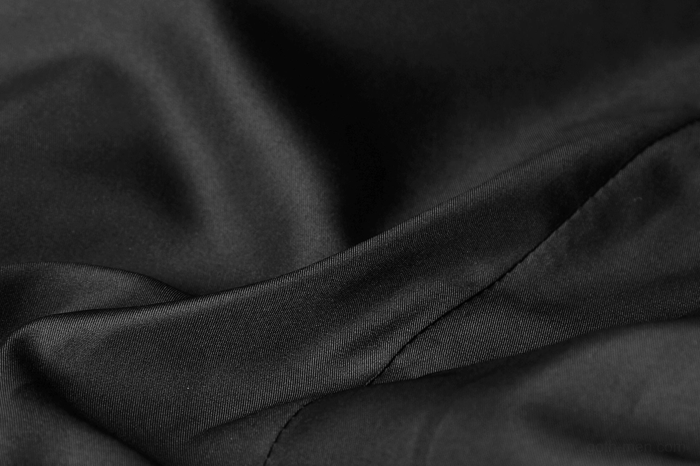 Gothic waistcoat detail showing pocket placement and tailored fit on male model in alternative styling