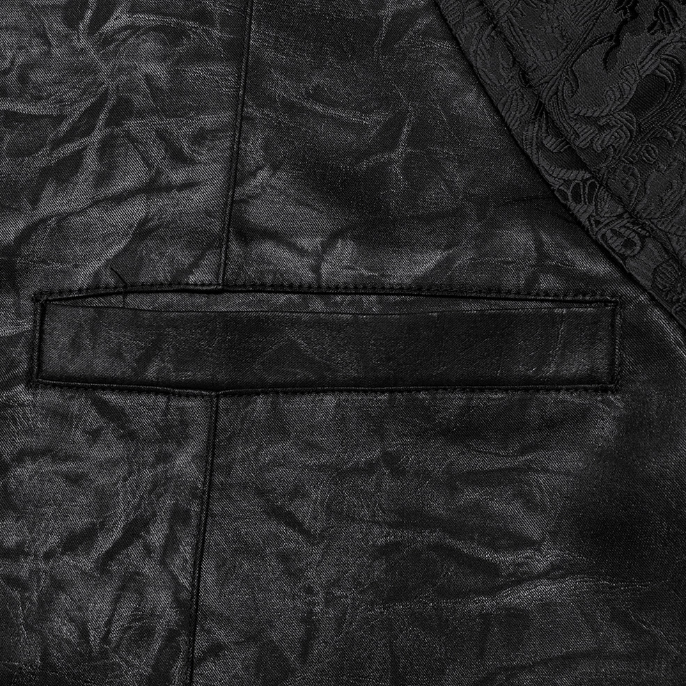Detailed close-up of faux leather flap pocket with precise stitched seams and embossed surface on gothic waistcoat