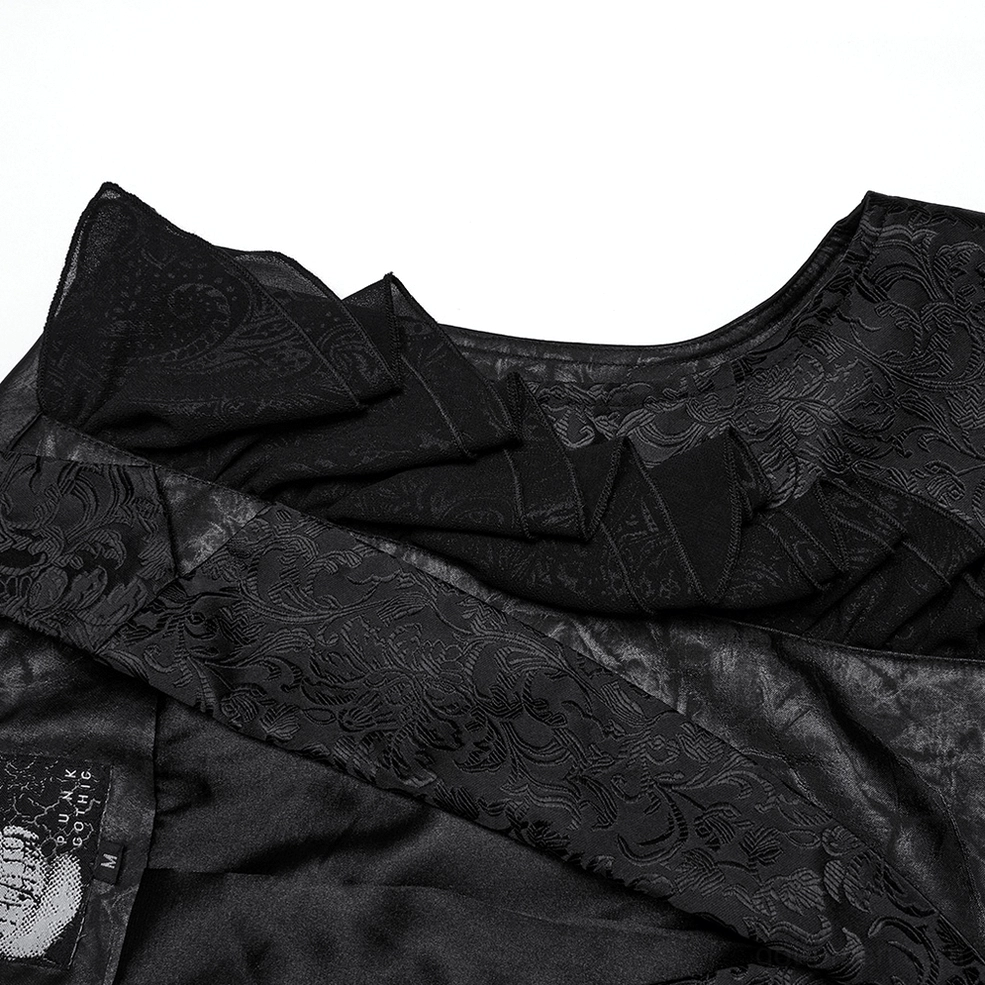 Close-up of ruffled jacquard trim, satin interior lining, and neck tag details on Victorian gothic waistcoat