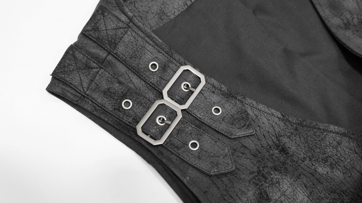 Shoulder strap detail of black gothic waistcoat featuring dual metal buckles and matching distressed leather