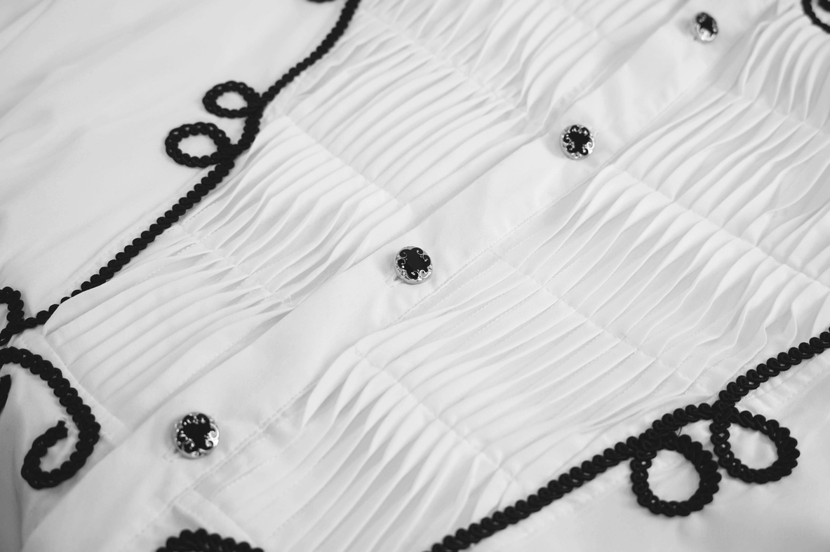 Ornamental black scroll embroidery on white gothic men's shirt - baroque design detail