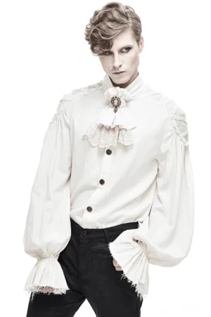 Vintage white gothic shirt front view with stand collar, frayed flared cuffs, and embossed metal buttons on male model