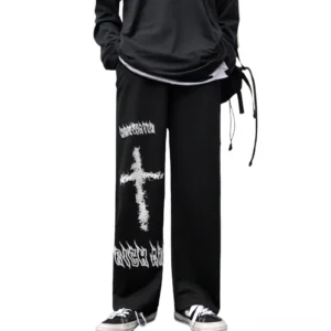 Black gothic wide leg pants with white graffiti cross print, front view on male model