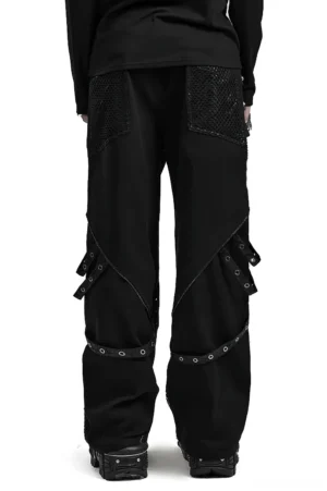 Black gothic wide-leg pants rear view showing side strap hardware and mesh details on male model