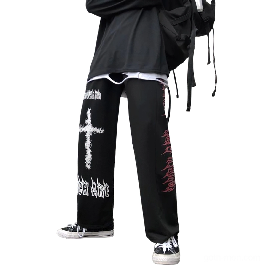 Black gothic wide leg trousers three-quarter side view showing dual color prints and movement