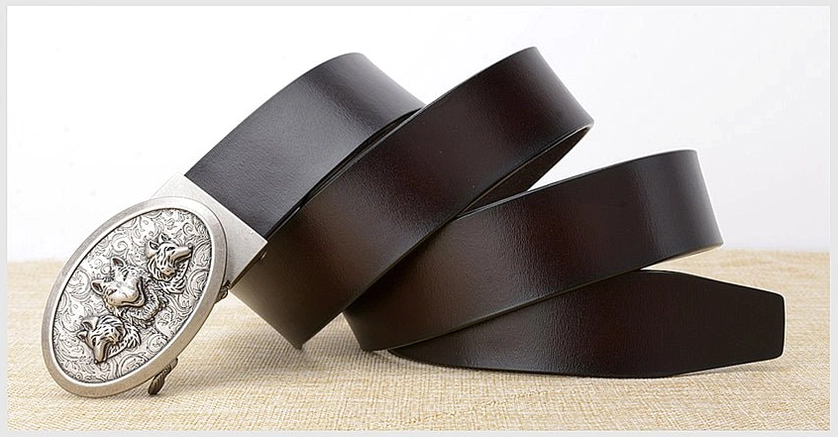 Genuine cowhide gothic belt close-up showing wolf buckle craftsmanship and leather texture detail