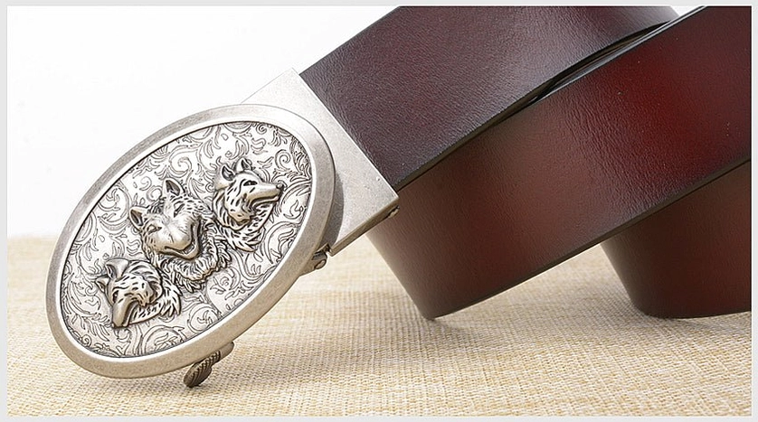 Gothic wolf embossed belt styling guide, worn with alternative fashion outfit on dark background