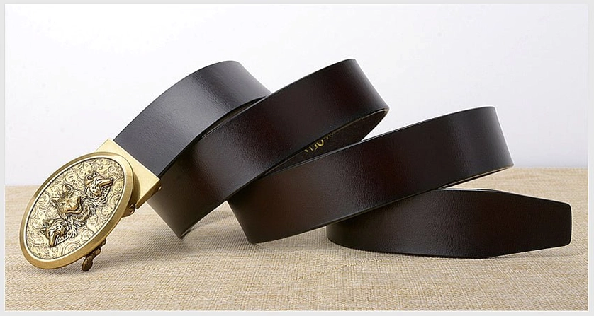Gothic automatic buckle belts with wolf embossed details, mixed collection shot on natural background