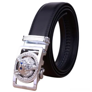 Black gothic leather belt with silver tone wolf head buckle featuring blue gemstone eyes and rhinestone embellishments, oblique front view coiled