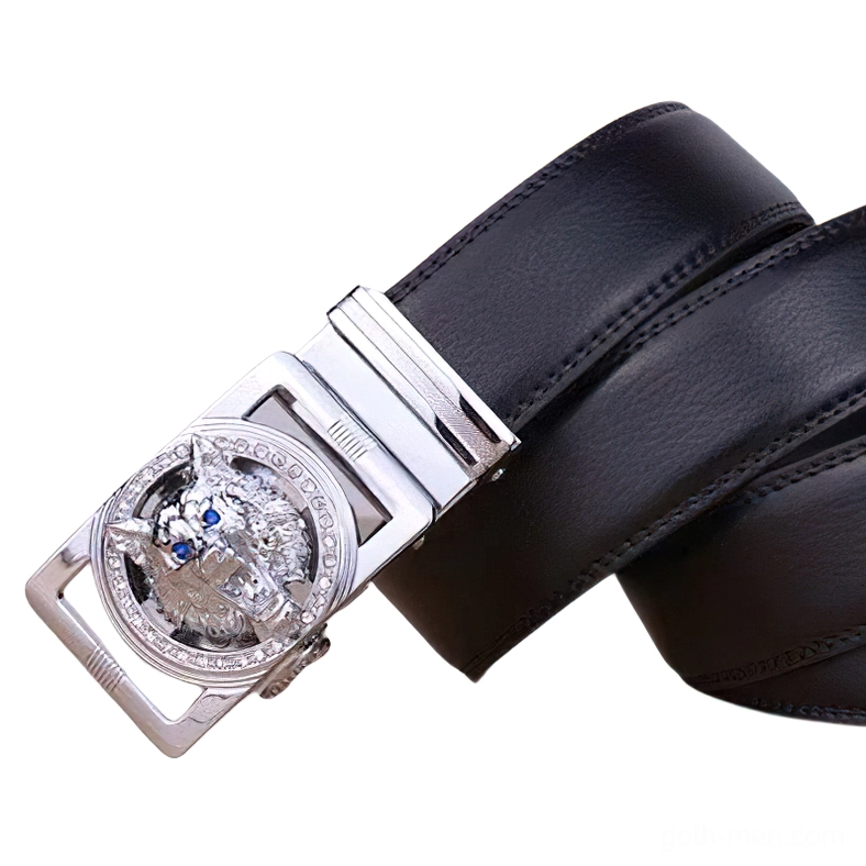 Men's gothic wolf head belt with light silver rhinestone-framed buckle and blue gemstone eyes, side oblique angle on coiled black leather