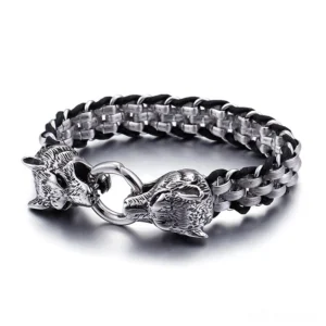 Gothic wolf head stainless steel leather bracelet for men, front flat lay view with dual wolf head clasps and woven chain design