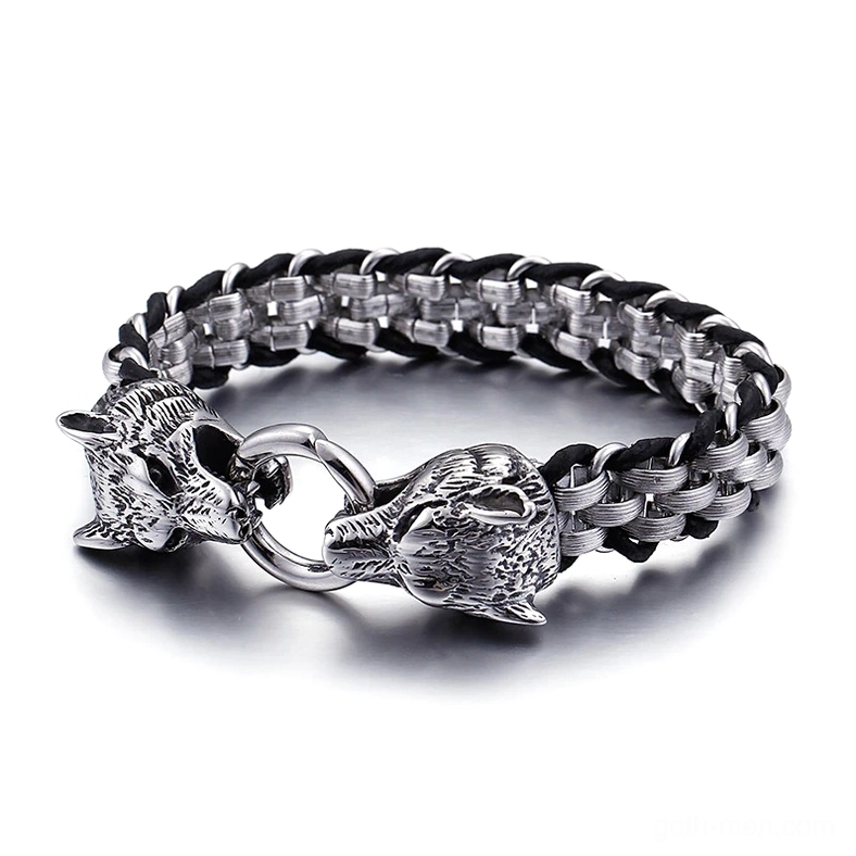 Gothic wolf head stainless steel leather bracelet for men, front flat lay view with dual wolf head clasps and woven chain design