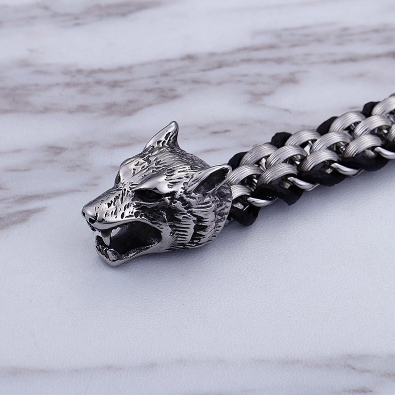 Men's alternative fashion wolf head bracelet closeup highlighting predatory wolf head design and clasp details