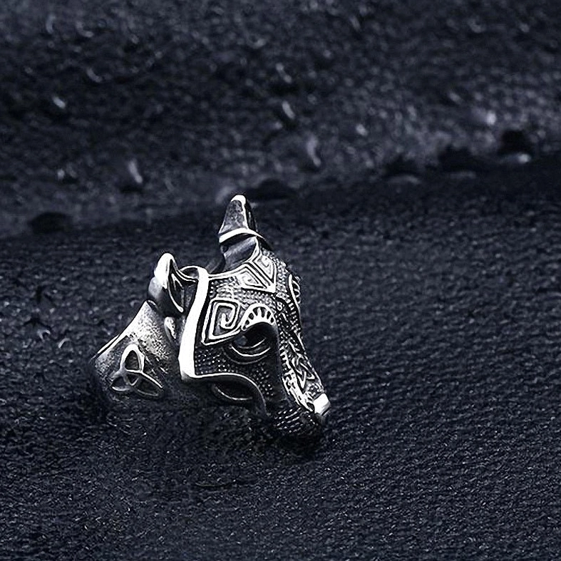 Dark gothic wolf head ring, intricately carved design, antique silver finish, dimensional lighting showing wolf features