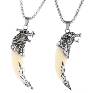gothic wolf tooth pendant necklace overhead flat lay view two styles dragon wolf head caps silver alternative jewelry