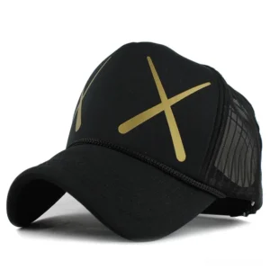 Black gothic mesh baseball cap with golden XX cross print, front oblique view showcasing 5-panel trucker design and adjustable mesh back