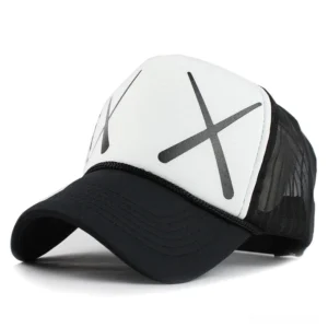 White and black gothic trucker cap with XX pattern print, studio front angle showing mesh side panels and structured crown
