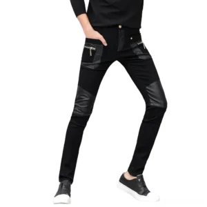 Black gothic slim zipper pants front view with leather knee patches and metal hardware on male model