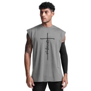 Gray gothic cross letter print sleeveless tank top worn by tattooed male model, front view