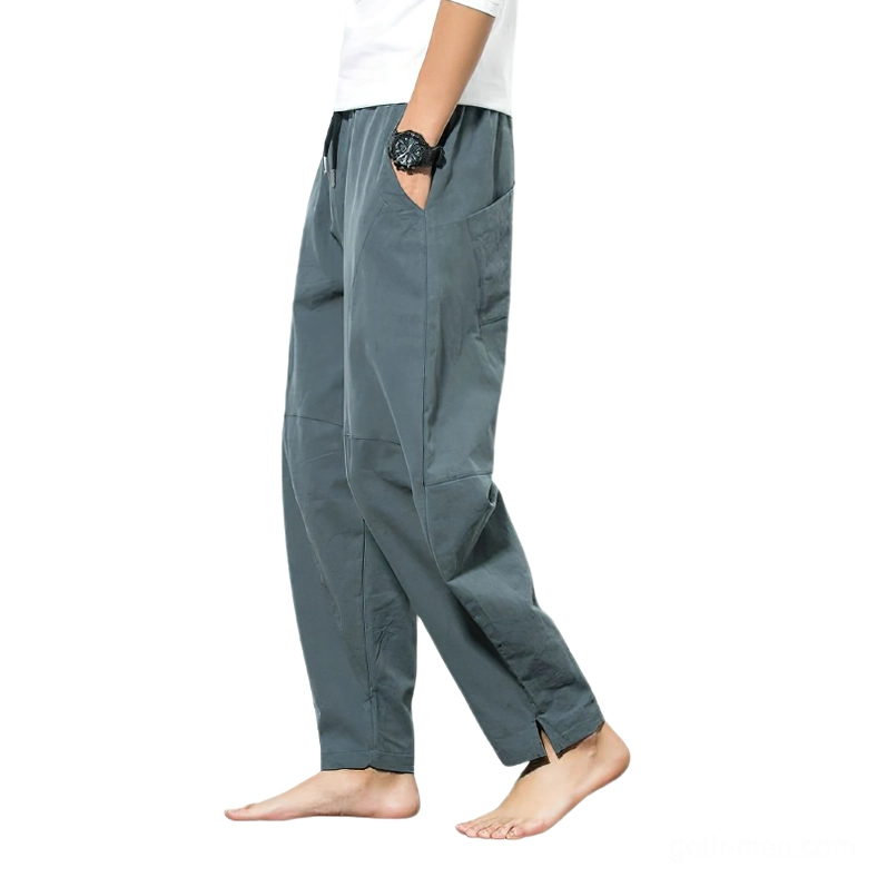 Gray gothic harem pants three-quarter view demonstrating overall silhouette and relaxed drape